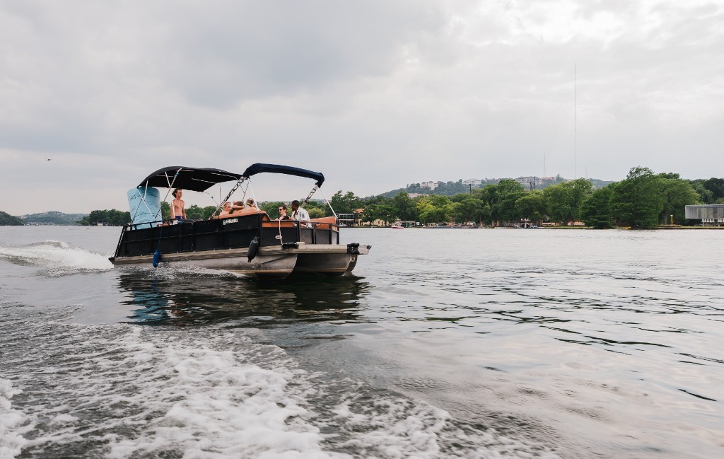 Pontoon charter underway on Lake Austin